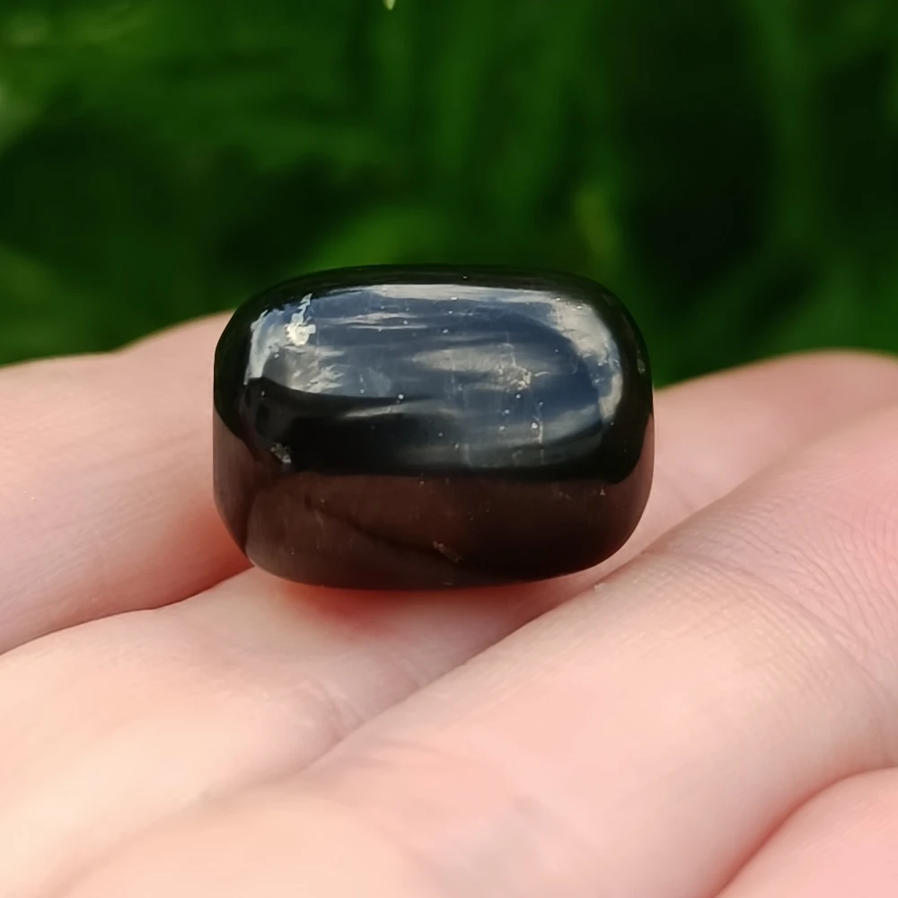 Schwarzes Tönnchenfoermige Perle aus Schungit